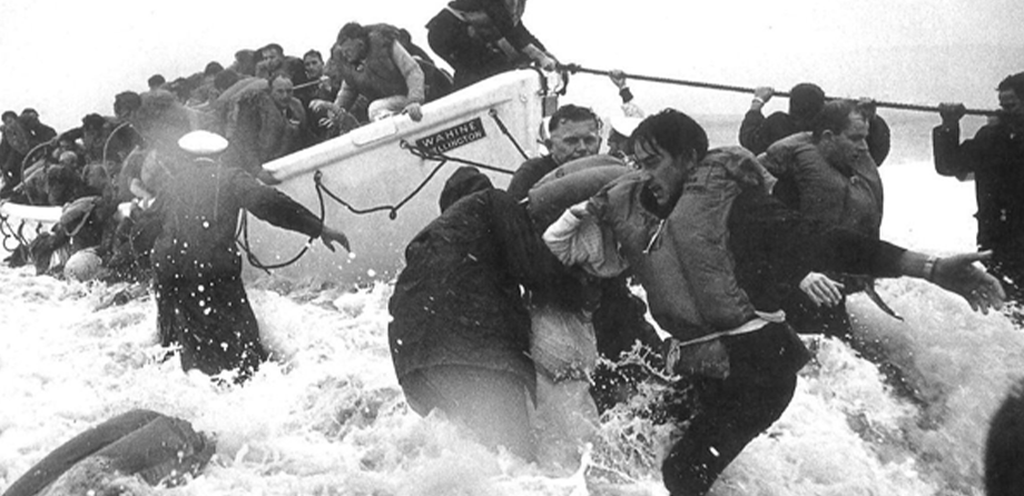 Teams rescuing people from lifeboats.