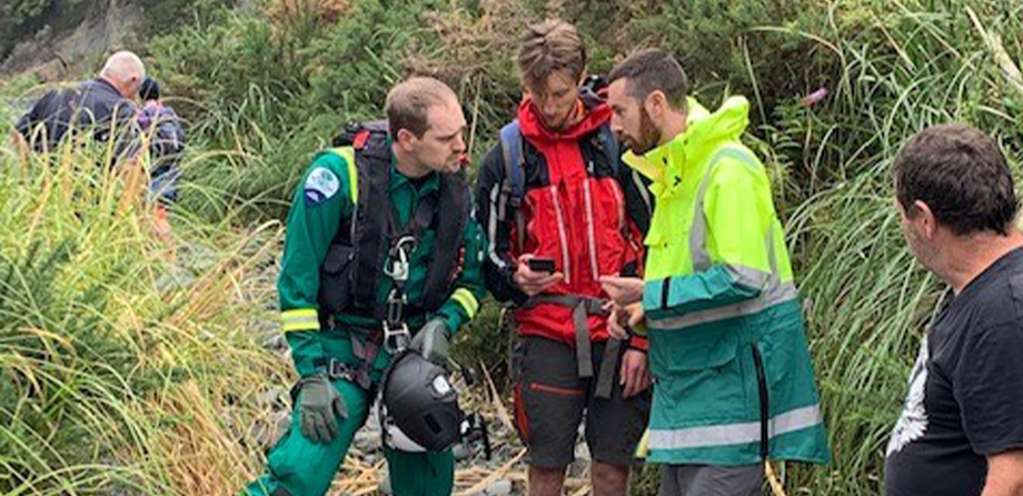 Our team working together to plan the extrication of a patient during a rescue job.