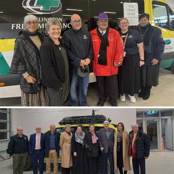 2 groups of people stand in front of an ambulance and a rescue vehicle