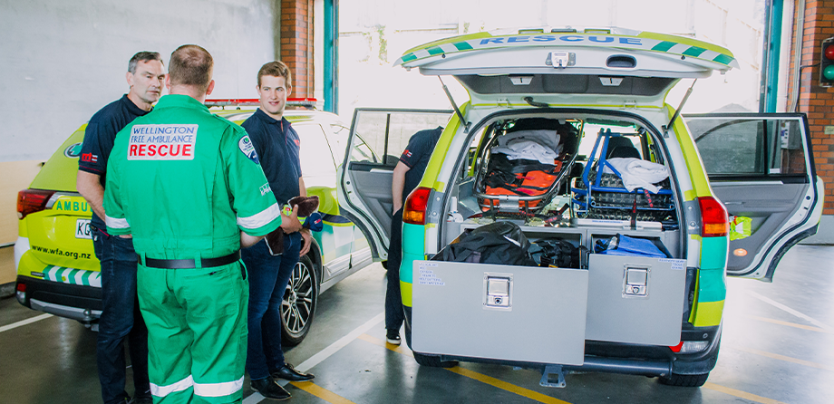 Rescue Paramedic Brendan showing the RRT team around Wellington Free's rescue vehicle.