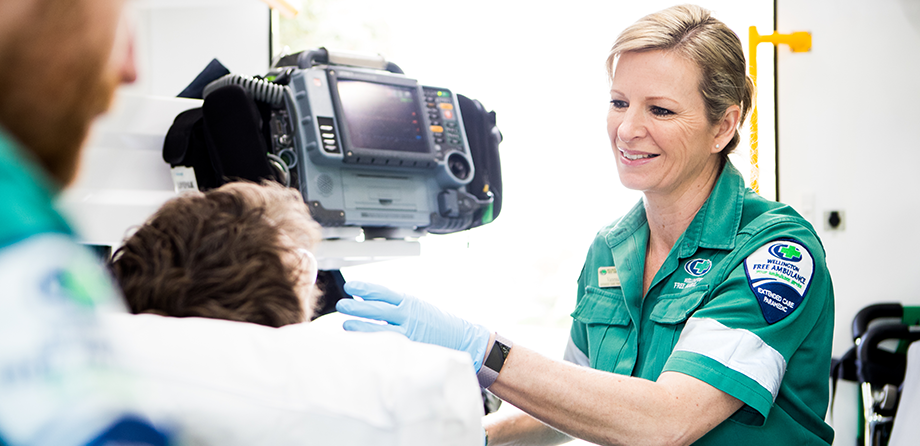 Paramedic smiling at patient