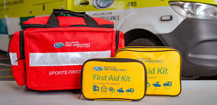 A close up of 3 first aid kits
