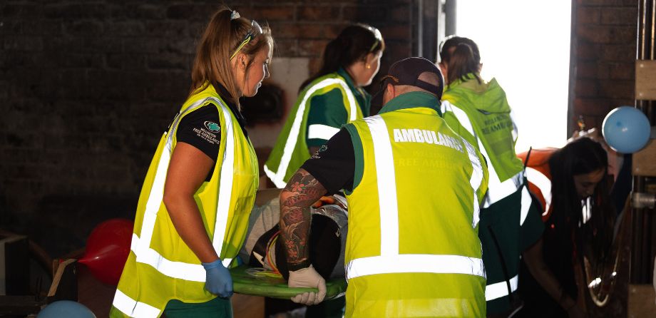 Paramedics carrying a stretcher
