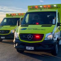 2 ambulances with flashing lights